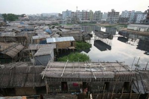 Image of a slum or shanty town showing temporary structures and no accessible roads