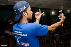 Man uses sign language to communicate on the telephone