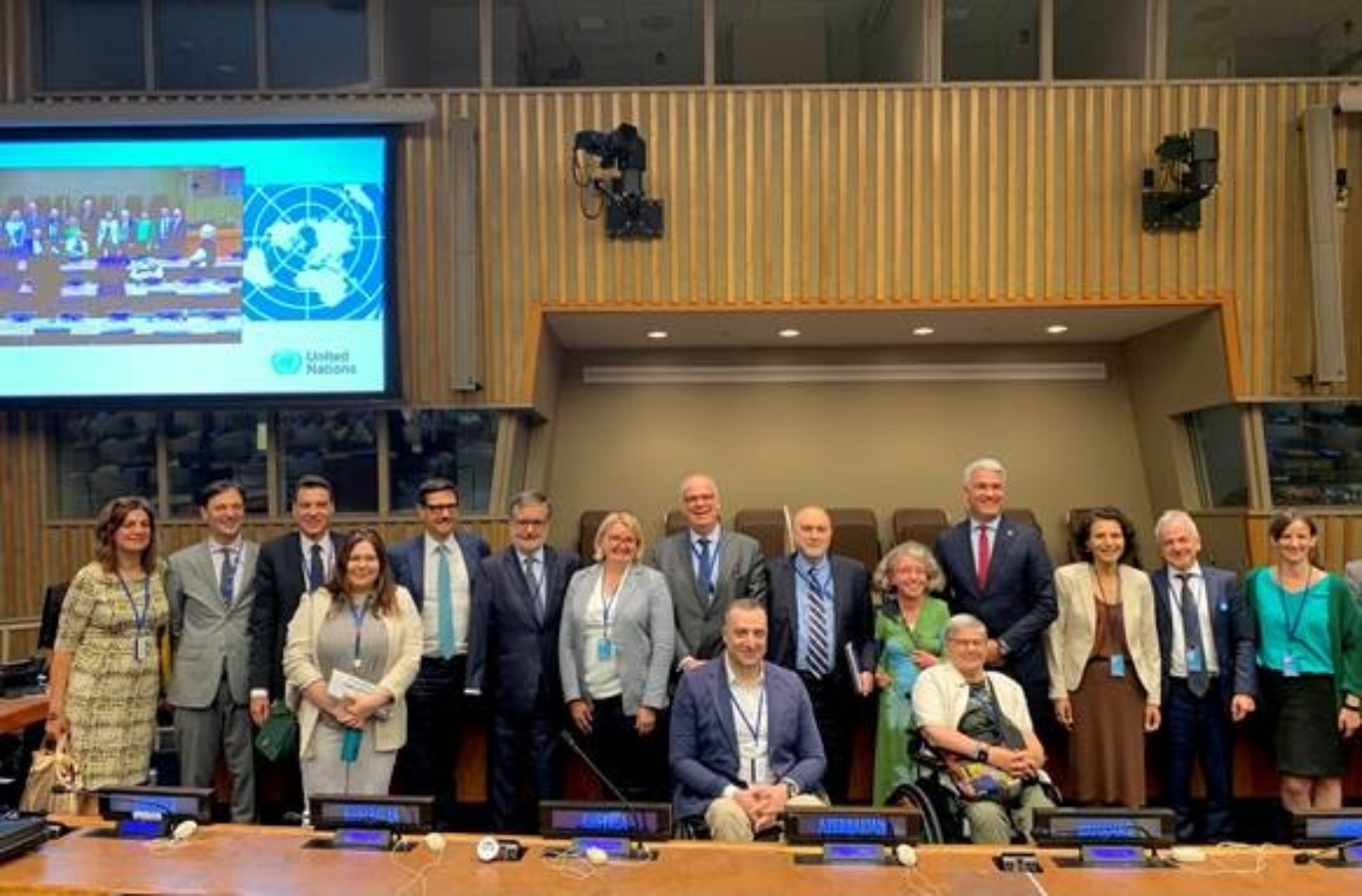 A Group Photo of the Delegations and Panelists