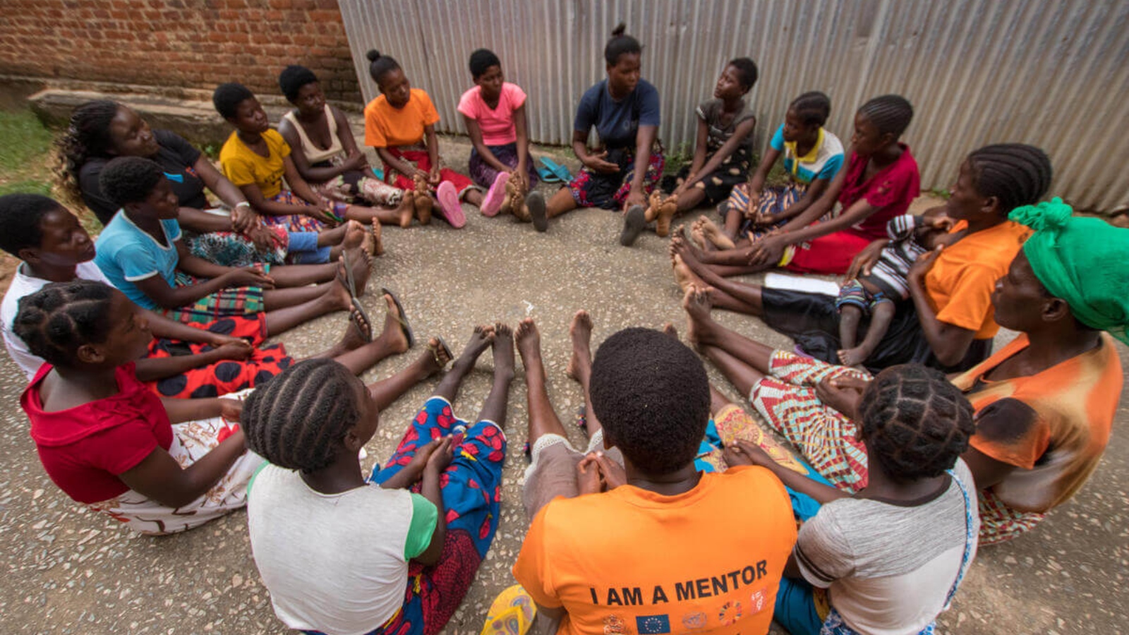 Young women gather at a UNFPA Safe Space in Bangula camp. © UNFPA/Eldson Chagara 
